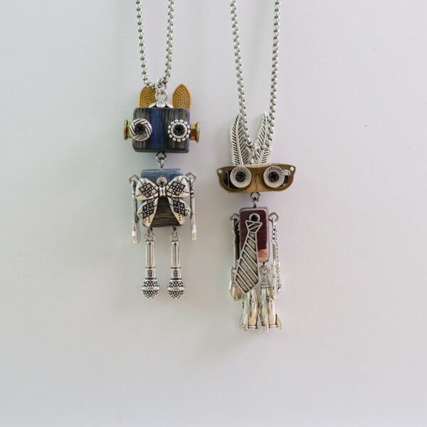 O1CN015nuDQ01WIse780ATB_2215393582766-0-cib.jpg Handmade steampunk robot necklace with wooden and metal details