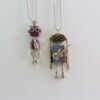 O1CN01P8jhE51WIse91shLb_2215393582766-0-cib.jpg Handcrafted wooden steampunk robot pendant necklace, front view
