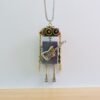 O1CN01V6VeZe1WIse8BUJUU_2215393582766-0-cib.jpg Steampunk robot pendant necklace shown from a three-quarter angle